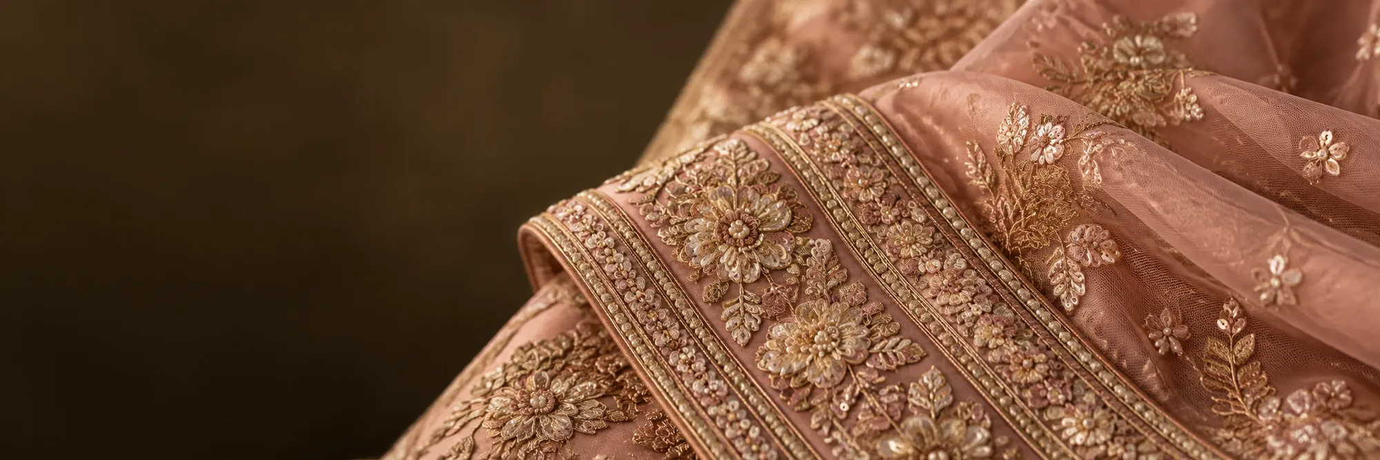 Gold embroidered border on champagne silk